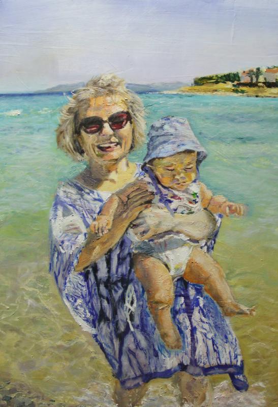 Woman with her grandson in beach